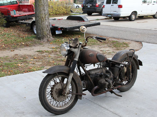 The Zundapp KS601 on the driveway, home from storage after lightning strike, front right.