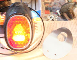 Brightness of tail light alone with no reflector.